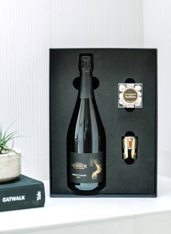 The perfect gift&nbsp;to say "Cheers" for every occasion. Our "Cheers Gift Bundle" includes a bottle of boutique bubbles, a SugarFina candy cube, gold champagne stopper and tasting notes.