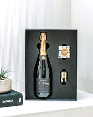 The perfect gift&nbsp;to say "Cheers" for every occasion. Our "Cheers Gift Bundle" includes a bottle of boutique bubbles, a SugarFina candy cube, gold champagne stopper and tasting notes.