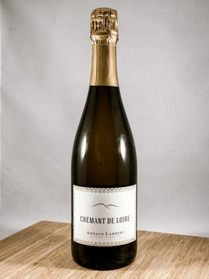A bottle of Crémant de Loire Arnaud Lambert sparkling wine, part of our champagne delivery and great for unique gift ideas.