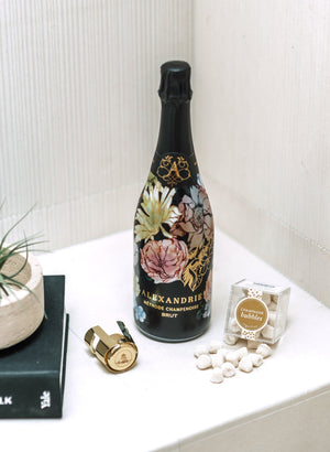 The perfect gift&nbsp;to say "Cheers" for every occasion. Our "Cheers Gift Bundle" includes a bottle of boutique bubbles, a SugarFina candy cube, gold champagne stopper and tasting notes.