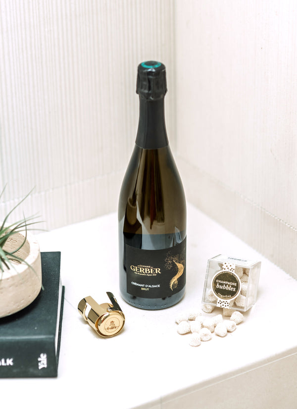 The perfect gift&nbsp;to say "Cheers" for every occasion. Our "Cheers Gift Bundle" includes a bottle of boutique bubbles, a SugarFina candy cube, gold champagne stopper and tasting notes.