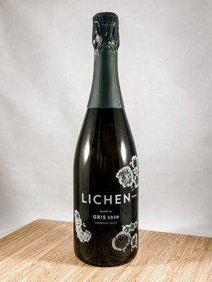 A bottle of Lichen sparkling wine, part of our champagne delivery and great for unique gift ideas.