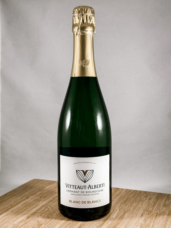 A bottle of Vitteaut-Alberti Créant de Bourgogne Blanc de Blancs sparkling wine, part of our champagne delivery and great for unique gift ideas.