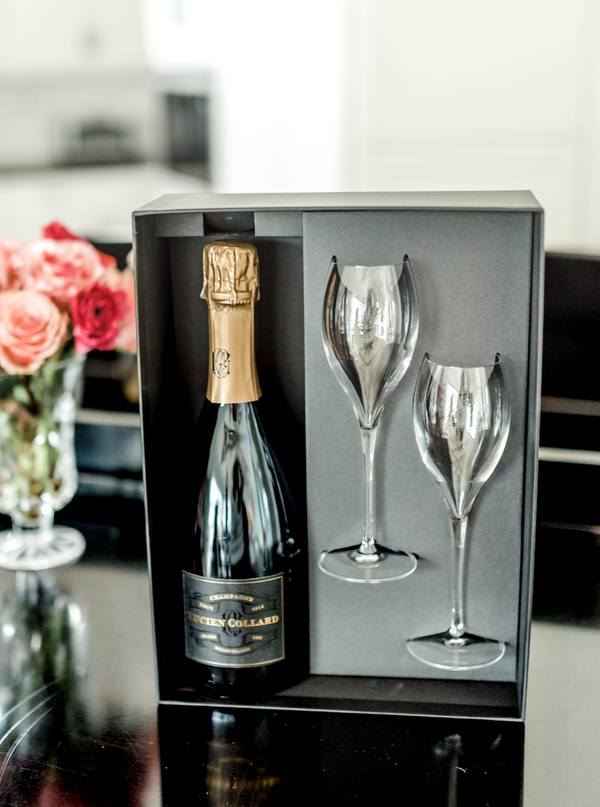 The perfect gift to say Happy Anniversary! Packaged in an elegant gift box, this set includes one bottle of Lucien Collard Grand Cru 2014 Champagne and two tulip-style crystal toasting flutes.
