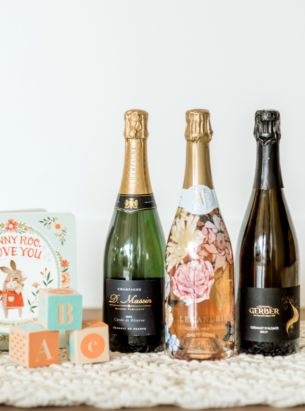  The perfect gift to the parents to celebrate the momentous first birthday! This set includes a selection of three small-batch, boutique sparkling wines and champagne.