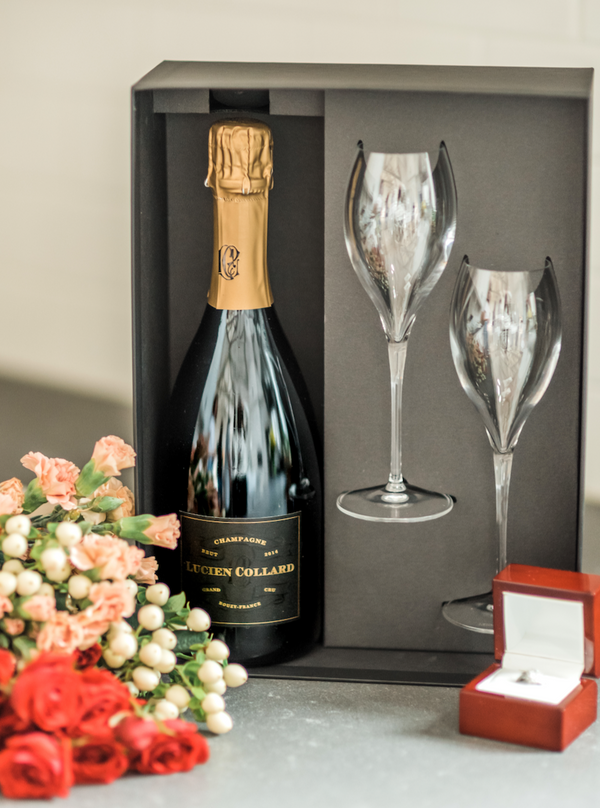 The perfect gift for the to-be-wed in your life! Packaged in an elegant gift box, this set includes one bottle of Lucien Collard Grand Cru 2014 Champagne and two tulip-style crystal toasting flutes
