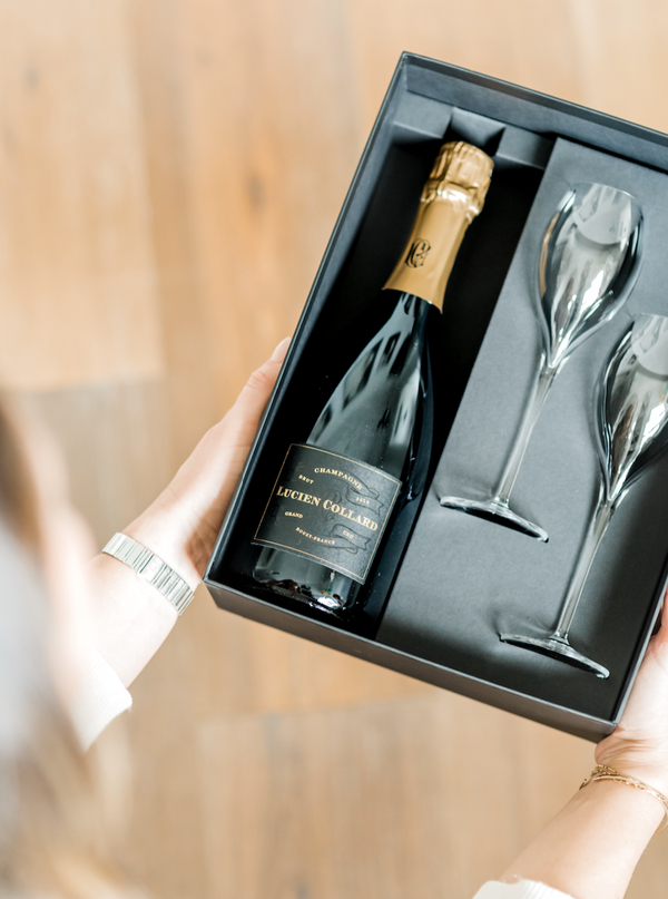The perfect gift for the to-be-wed in your life! Packaged in an elegant gift box, this set includes one bottle of Lucien Collard Grand Cru 2014 Champagne and two tulip-style crystal toasting flutes