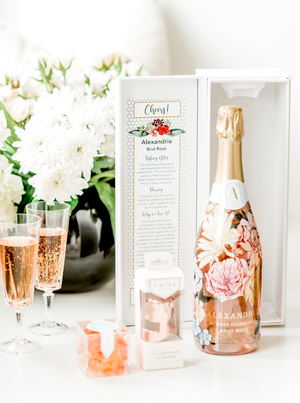 The perfect gift for the bride to be, or as a 'thank you' to your vendor team, wedding party or family members. Our Bride's Gift includes a bottle of Alexandrie Sparking Rosé in our celebratory "Cheers" gift box, and a rose gold champagne stopper.
